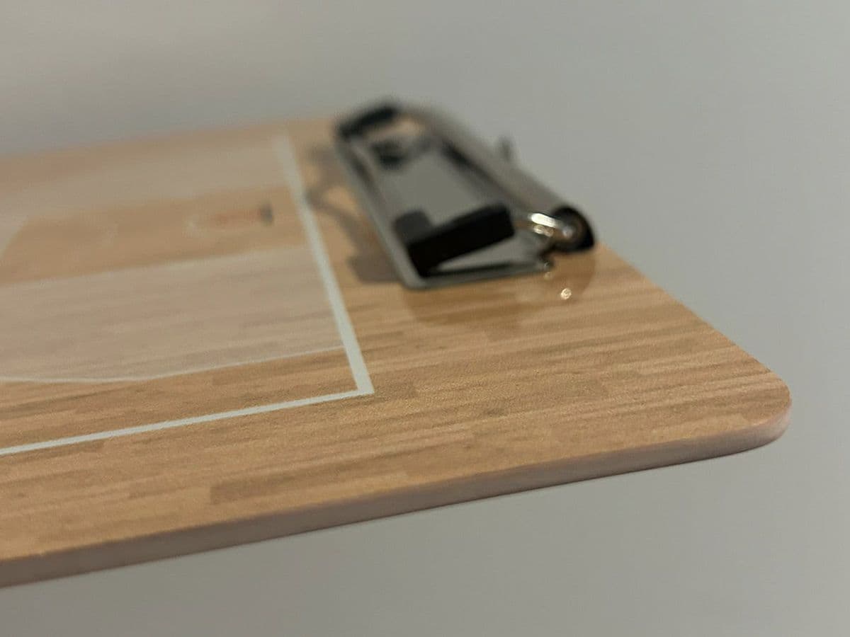 Detail of the composite board (texture, edges, clip)
